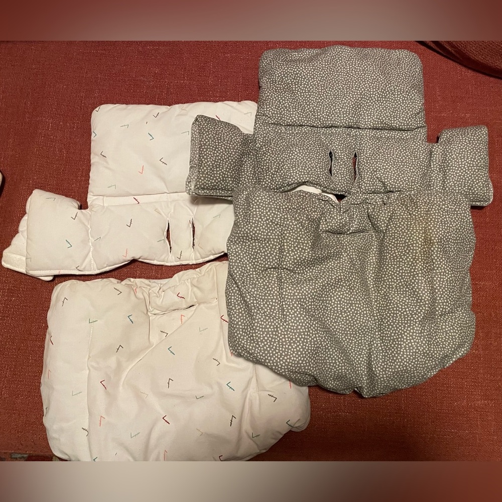 Two Stokke high chair padding for the Tripp Trapp